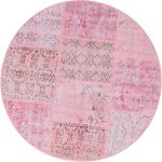 שטיח עגול ורוד מצמר עבודת יד בסגנון מרשים