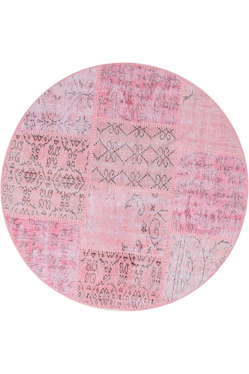 שטיח עגול ורוד מצמר עבודת יד בסגנון מרשים