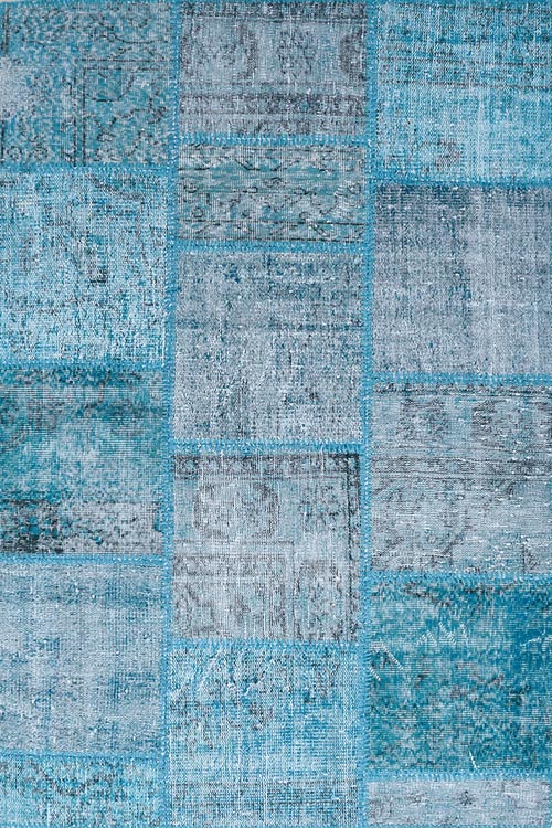 שטיח צמר טורקיז מלבני בעבודת יד