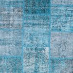 שטיח צמר בסגנון פאצ'וורק