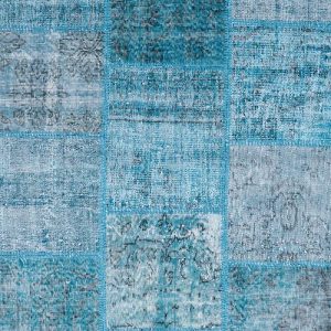 שטיח צמר בסגנון פאצ'וורק