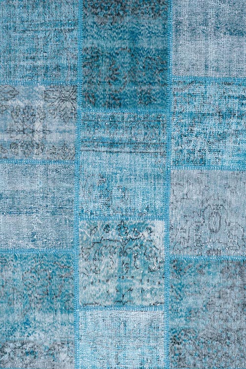 שטיח צמר בסגנון פאצ'וורק