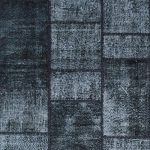 שטיח עיצוב משבצתי מלבני בגוונים שחור ולבן עשוי 100% צמר