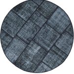 שטיח עגול בסגנון גיאומטרי עשוי צמר בצבע שחור-לבן מתאים במיוחד לחדר ילדים