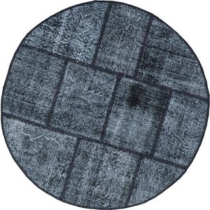 שטיח עגול בעיצוב טלאים שחור ולבן