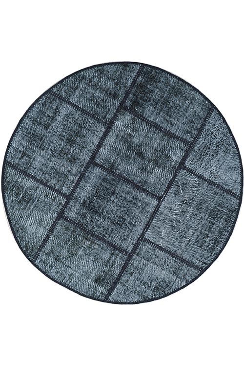 שטיח עגול שחור לבן מצמר בסגנון פאצ'וורק