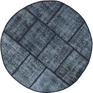 שטיח עגול גאומטרי בצבע שחור ולבן מצמר