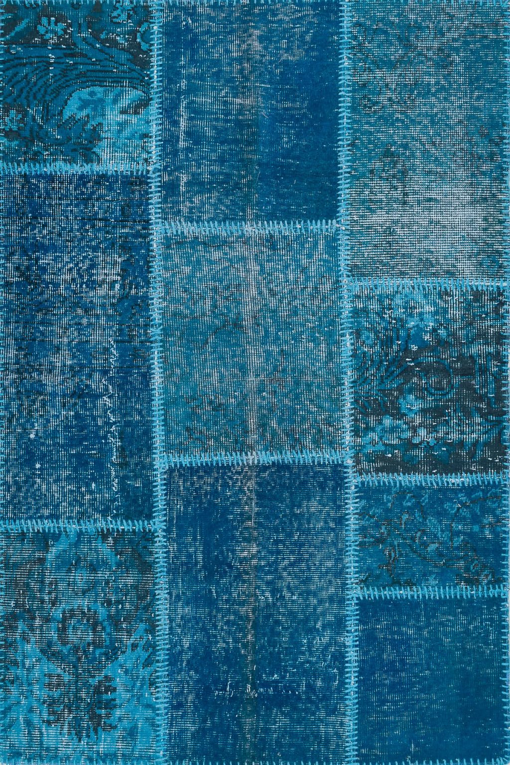 שטיח צמר בסגנון פאצ'וורק